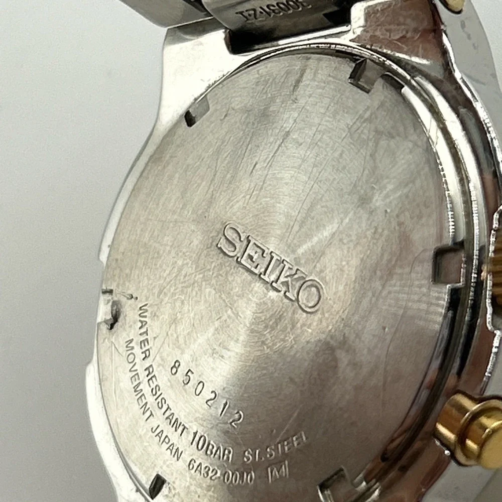 Seiko Men's SNQ076 Perpetual Calendar Two-Tone Watch #555